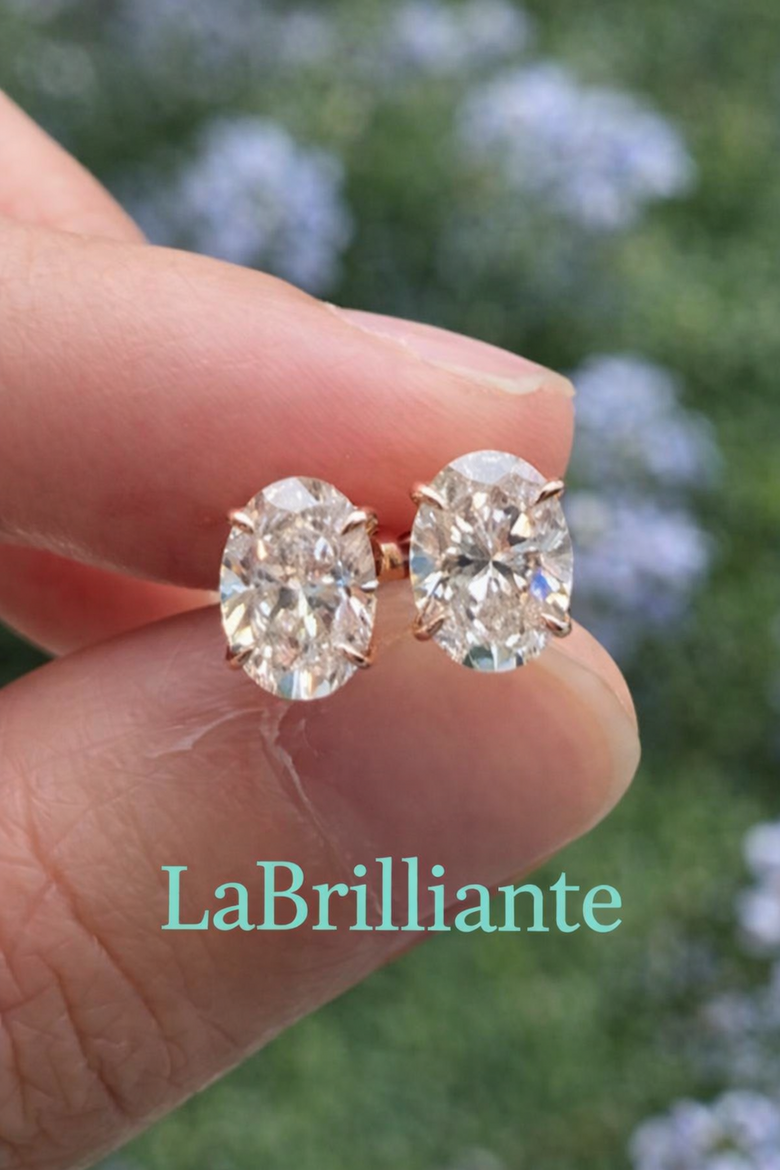 Custom Lab-Grown Diamond Earrings on Elegant Display - Showcasing personalized luxury designs with certification documents and 3D rendering tools, emphasizing direct-to-consumer value and creative freedom